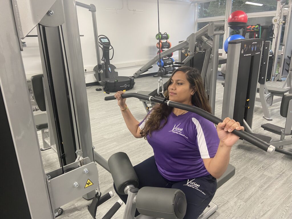 woman using gym equipment