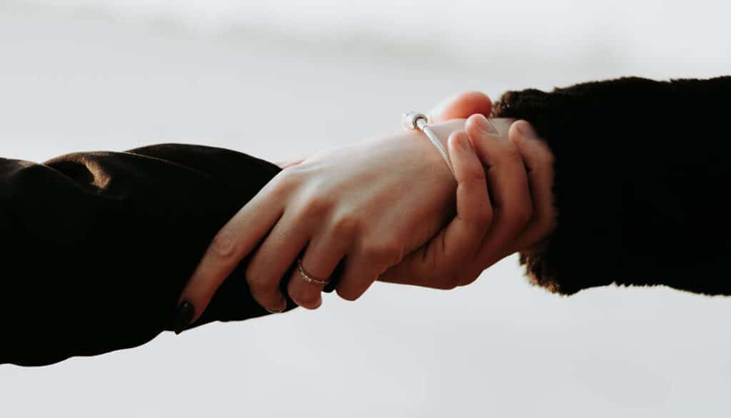 people holding hands