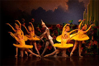 Group of dancers performing ballet on the stage