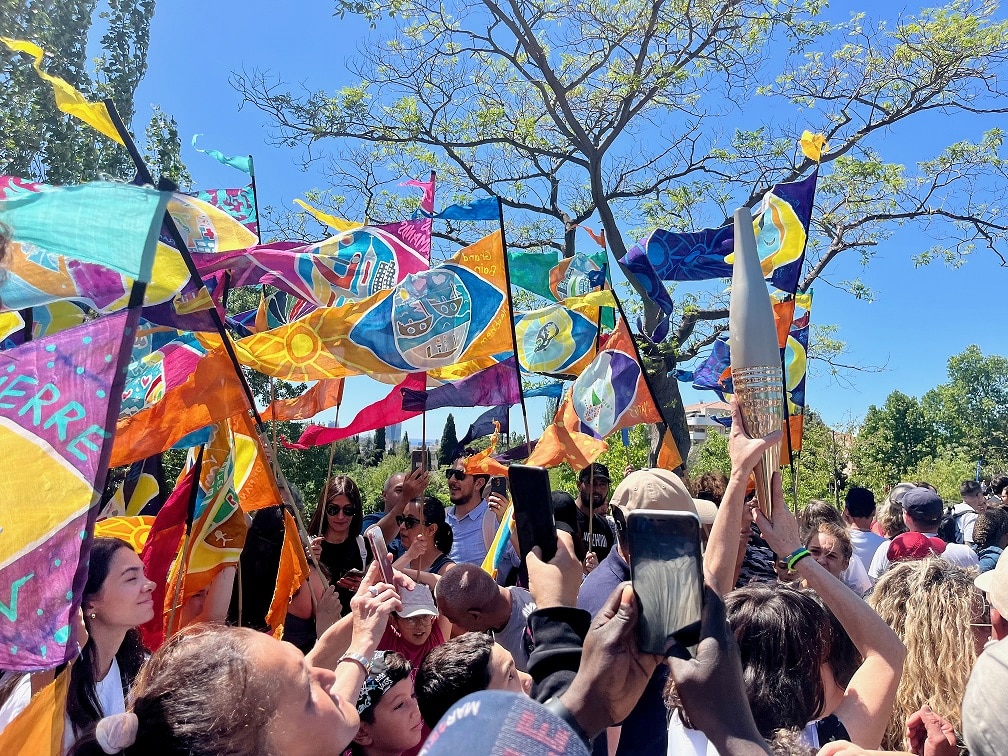 Colourful hand-made silk flags by Kinetika to be featured in the Streets of Colour Parade in Valentines Park this summer. Credit: Caroline Genis.