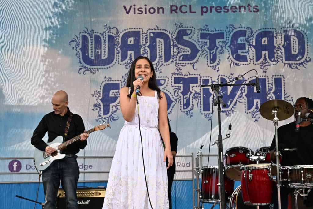Singer on the stage of the Wanstead Festival